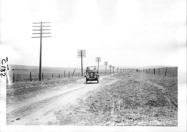 E.M.F. car on rural road, on pathfinder tour for 1909 Glidden Tour