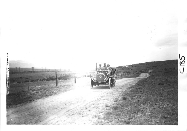 E.M.F. car on rural road, on pathfinder tour for 1909 Glidden Tour