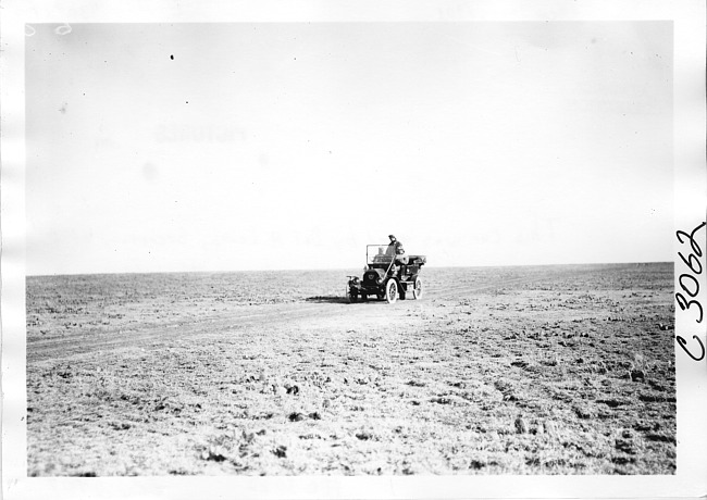 E.M.F. car on desolate rural road, on pathfinder tour for 1909 Glidden Tour