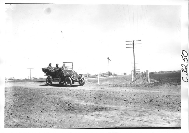 E.M.F. car on rural road, on pathfinder tour for 1909 Glidden Tour