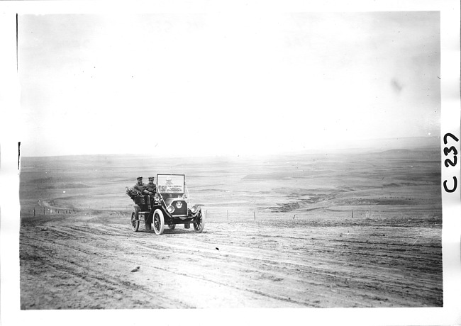 E.M.F. car on desolate rural road, on pathfinder tour for 1909 Glidden Tour