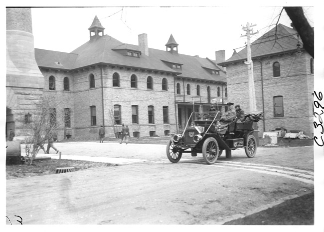 E.M.F. car in military barracks, on pathfinder tour for 1909 Glidden Tour