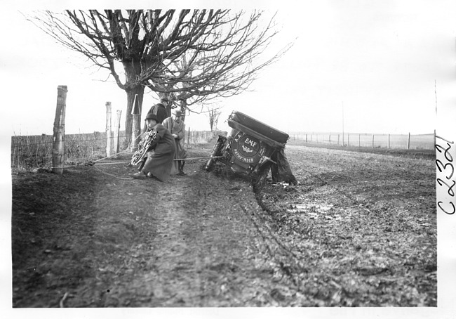 E.M.F. car stuck in mud, on pathfinder tour for 1909 Glidden Tour