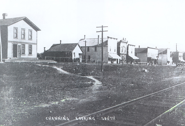 View of the east side of Railroad Street in Channing, Michigan