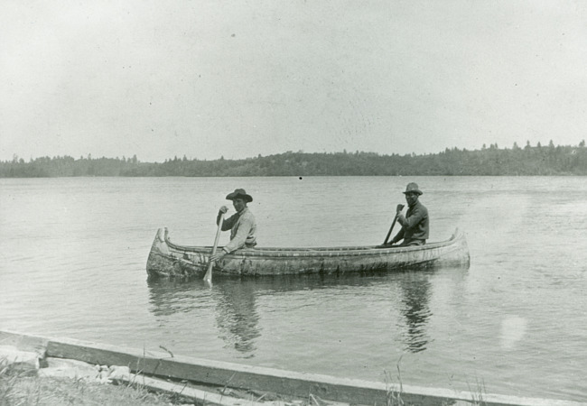 Menominee Joe and Jerome Dakota paddling near Eagle Island in Wisconsin