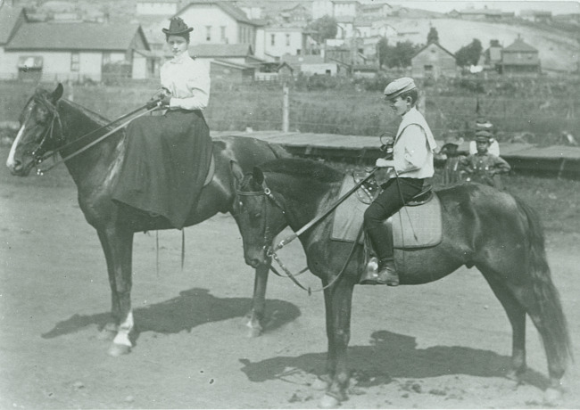 Ten-year-old Willie Kelly and his aunt on horseback
