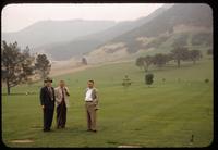 Three men looking over the newly established Hollywood Hills cemetery in Los Angeles, 1953