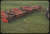 A 7 gang Toro Roughmaster mower with noisy, studded steel wheels, 1954
